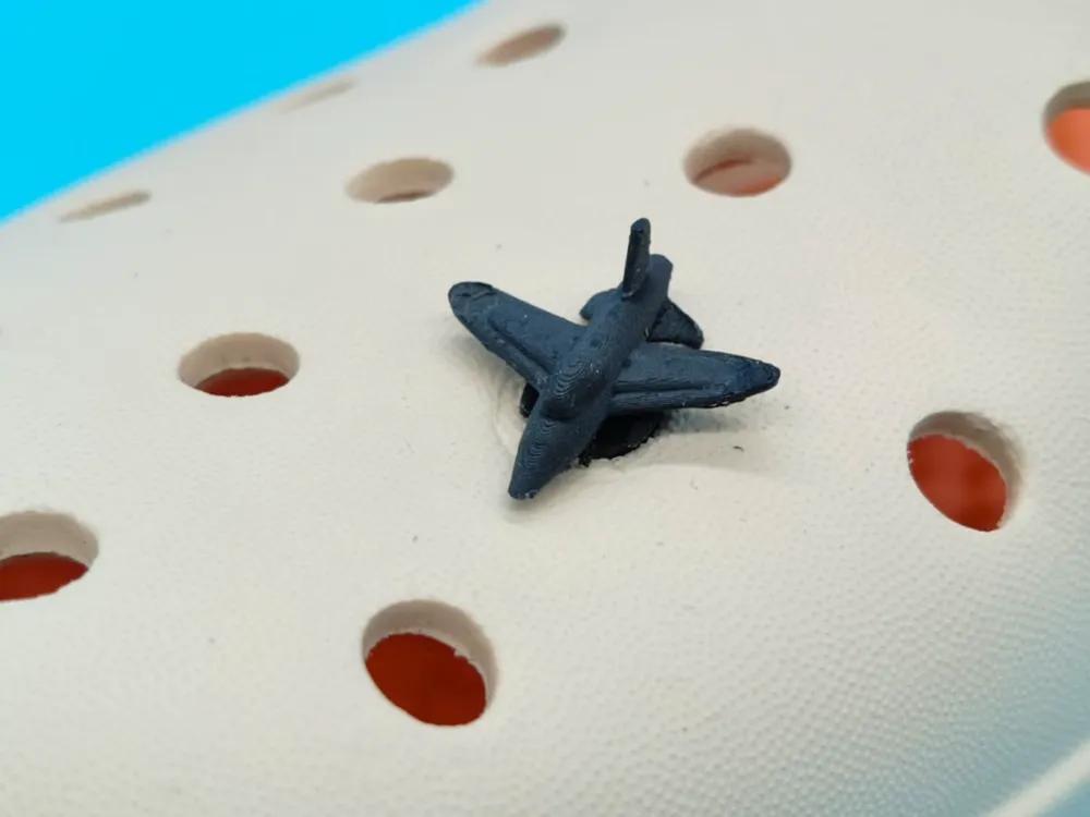 Fighter jet croc charm