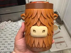 Highland cow can coozie